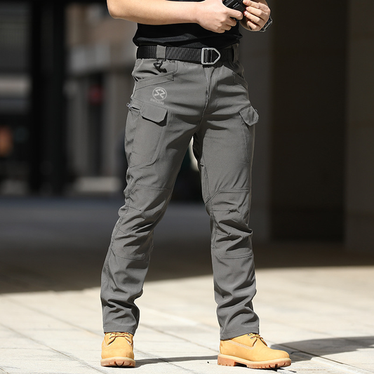 Grey tactical cargo pants with side pockets, adjustable waistband, and StateZero logo – suitable for urban and outdoor use