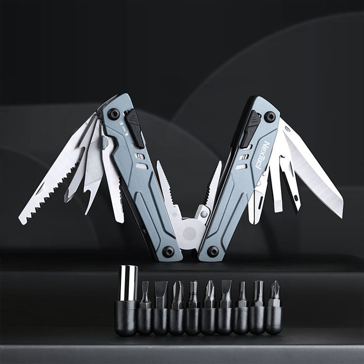 Folding tactical multitool with pliers, knives and screwdriver bits displayed on black background