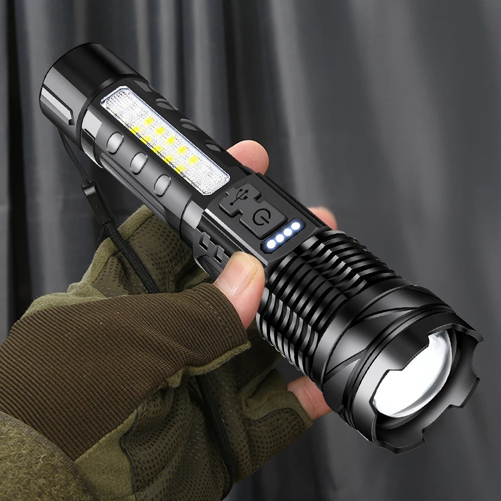 Tactical waterproof flashlight with white laser beam and side COB light held in gloved hand