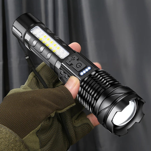 Tactical waterproof flashlight with white laser beam and side COB light held in gloved hand